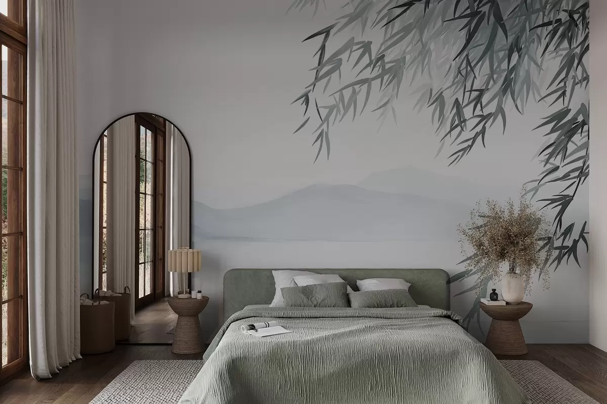 wall murals Бамбусово лишће виси изнад језера са планинама у позадини, нежни плави и бели тонови, стил сликања тушем w09048