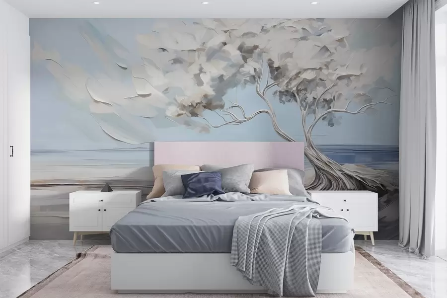 wall murals Бело дрво са дебелим и текстурираним листовима на пешчаној плажи, пејзаж са светлоплавим небом w09205